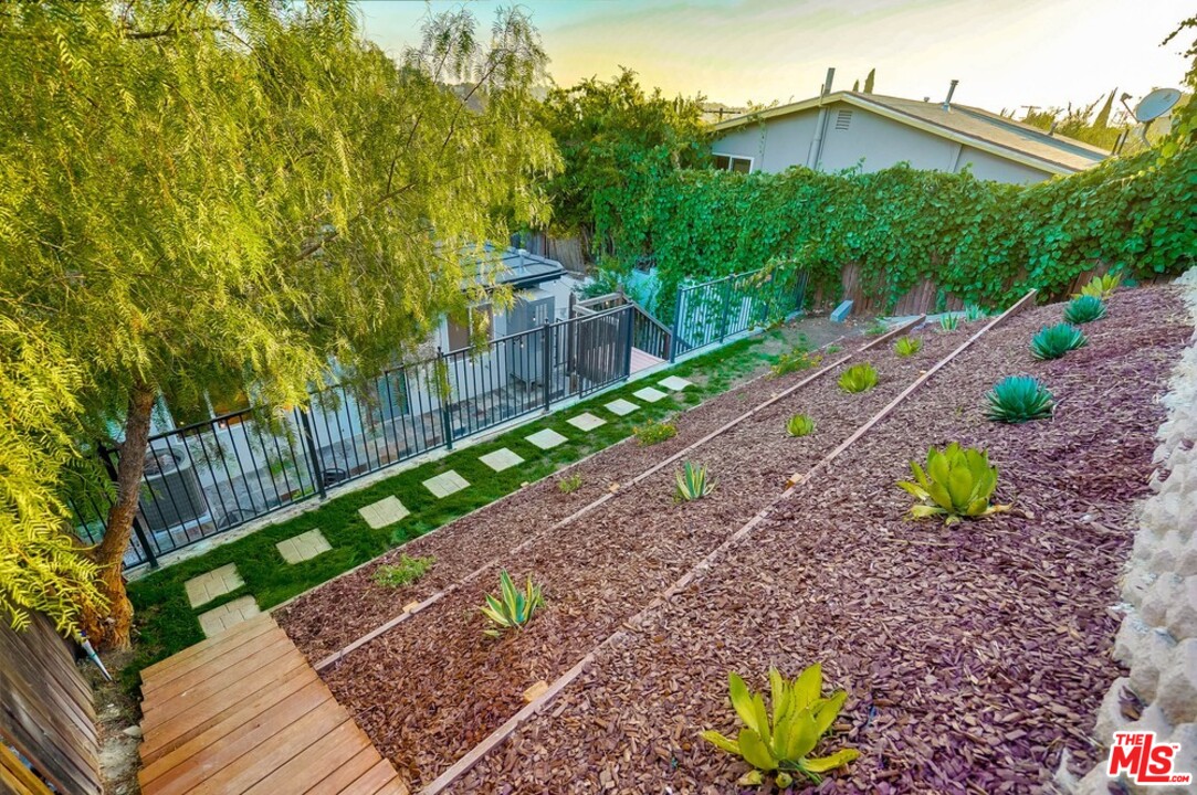 2049 Rome Drive Los Angeles, CA 90065 - Photo 31 of 43 a view of a backyard with a garden