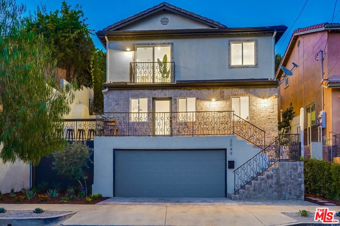 2049 Rome Drive Los Angeles, CA 90065 - Photo 43 of 43 a front view of a house with a yard