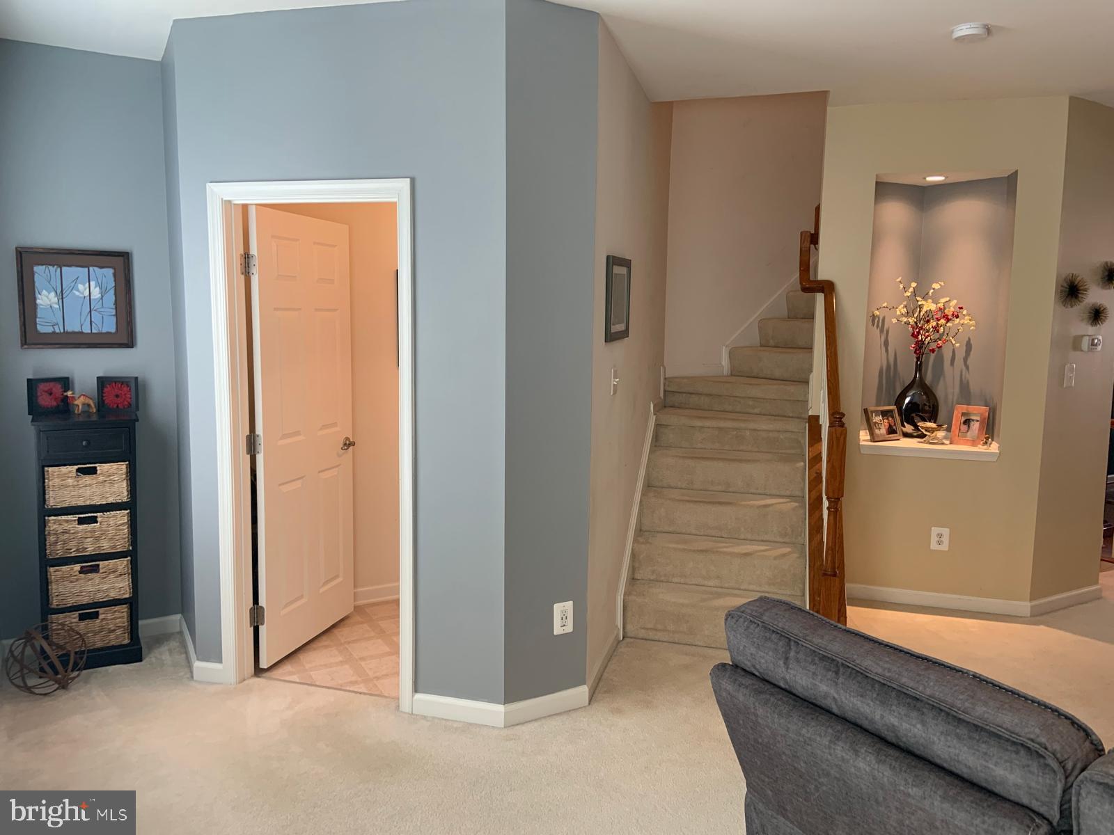 7012 Trek Way Gainesville, VA 20155 - Photo 6 of 23 Living Room w/ Powder Room
