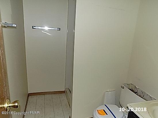 4152 Blueberry Hill Road Bushkill, PA 18324 - Photo 13 of 25 a bathroom with a window