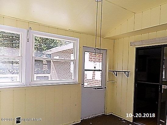 4152 Blueberry Hill Road Bushkill, PA 18324 - Photo 14 of 25 a view of a livingroom with a window