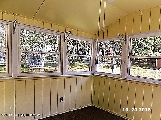 4152 Blueberry Hill Road Bushkill, PA 18324 - Photo 17 of 25 a view of a door and window