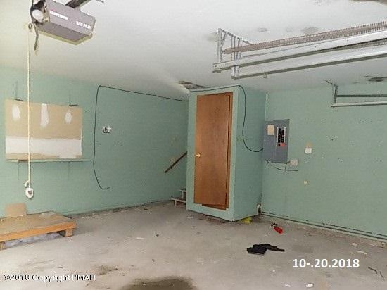 4152 Blueberry Hill Road Bushkill, PA 18324 - Photo 18 of 25 a view of a room with rack on the wall