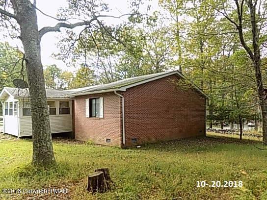 4152 Blueberry Hill Road Bushkill, PA 18324 - Photo 24 of 25 a backyard of a house with lots of green space