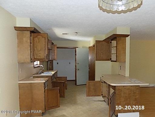 4152 Blueberry Hill Road Bushkill, PA 18324 - Photo 3 of 25 a room with storage and utility