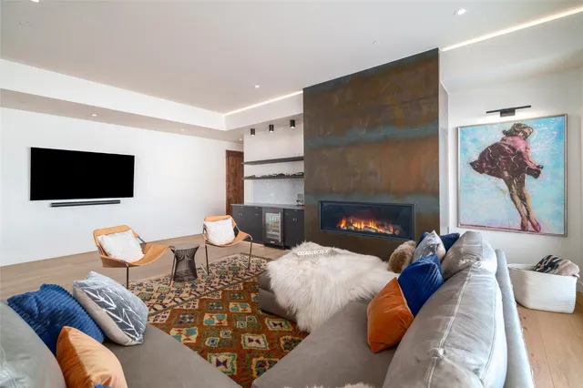 a view of front door with wooden floor and stairs