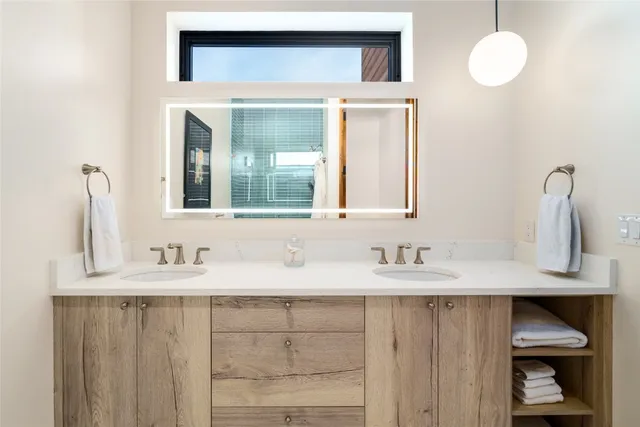 a bathroom with a toilet and a sink