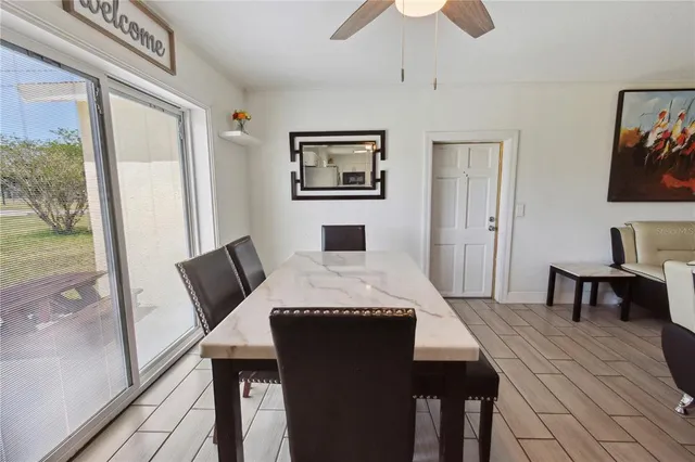 a living room with furniture and a table
