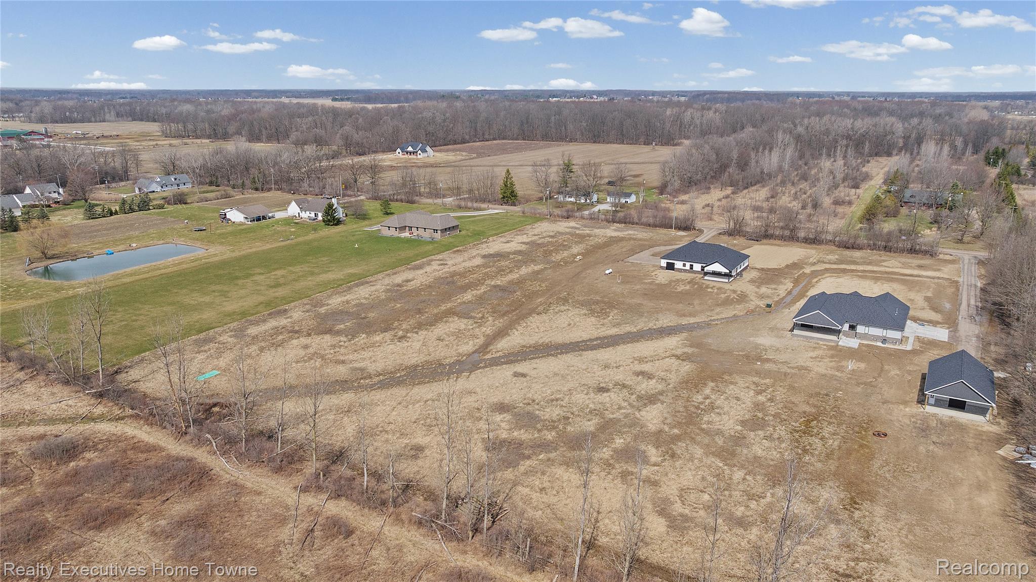 26850 Irwin Road Richmond, MI 48062 - Photo 41 of 47 Overview of rural landscape with a nearby body of water