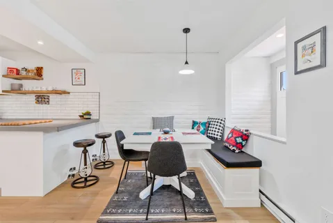 a view of a workspace with furniture