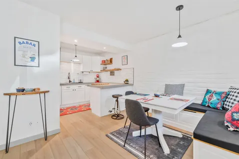 a workspace with furniture and window