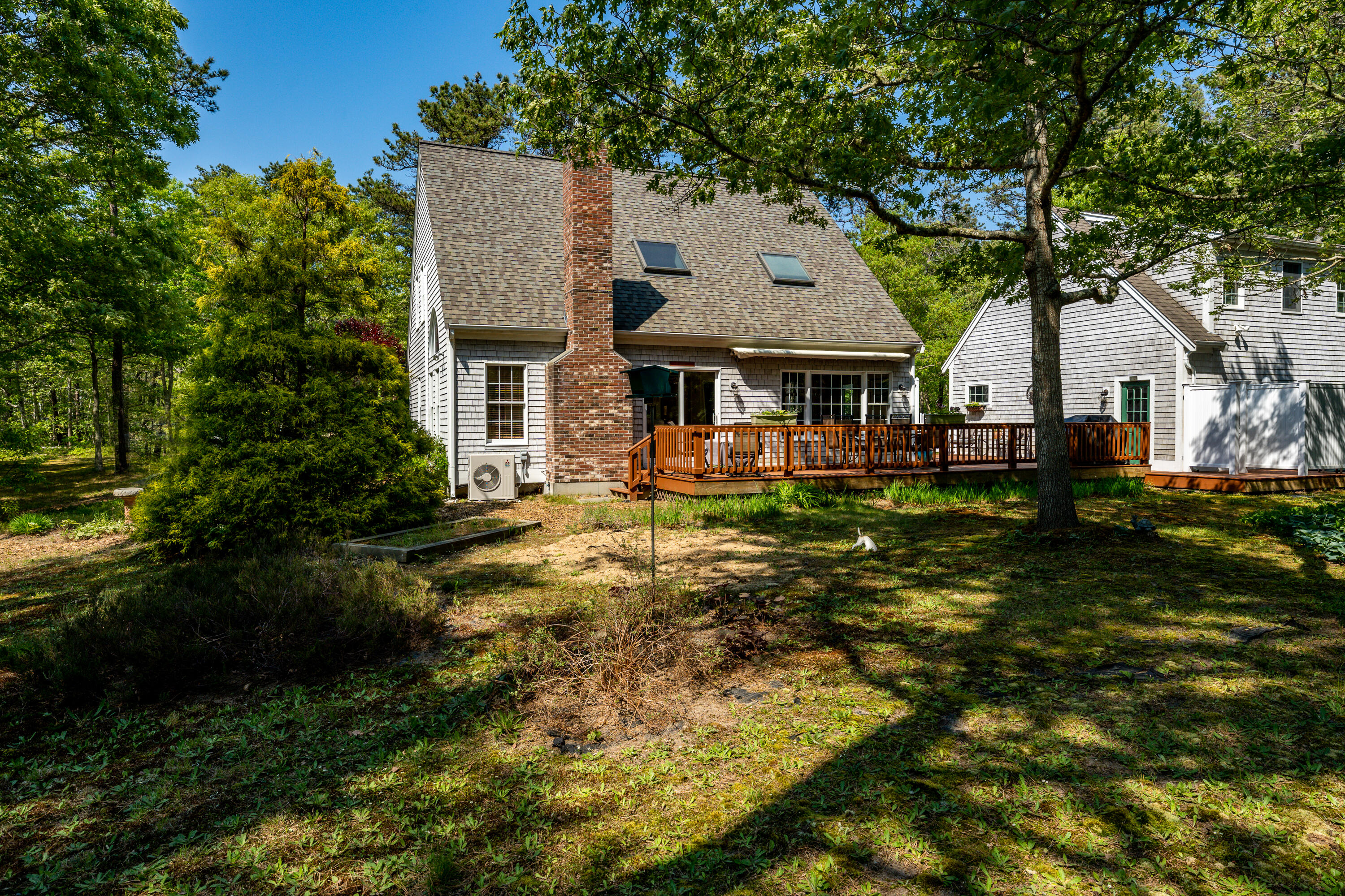 130 Browns Neck Road Wellfleet, MA 02667 - Photo 24 of 40 a front view of house with yard and trees