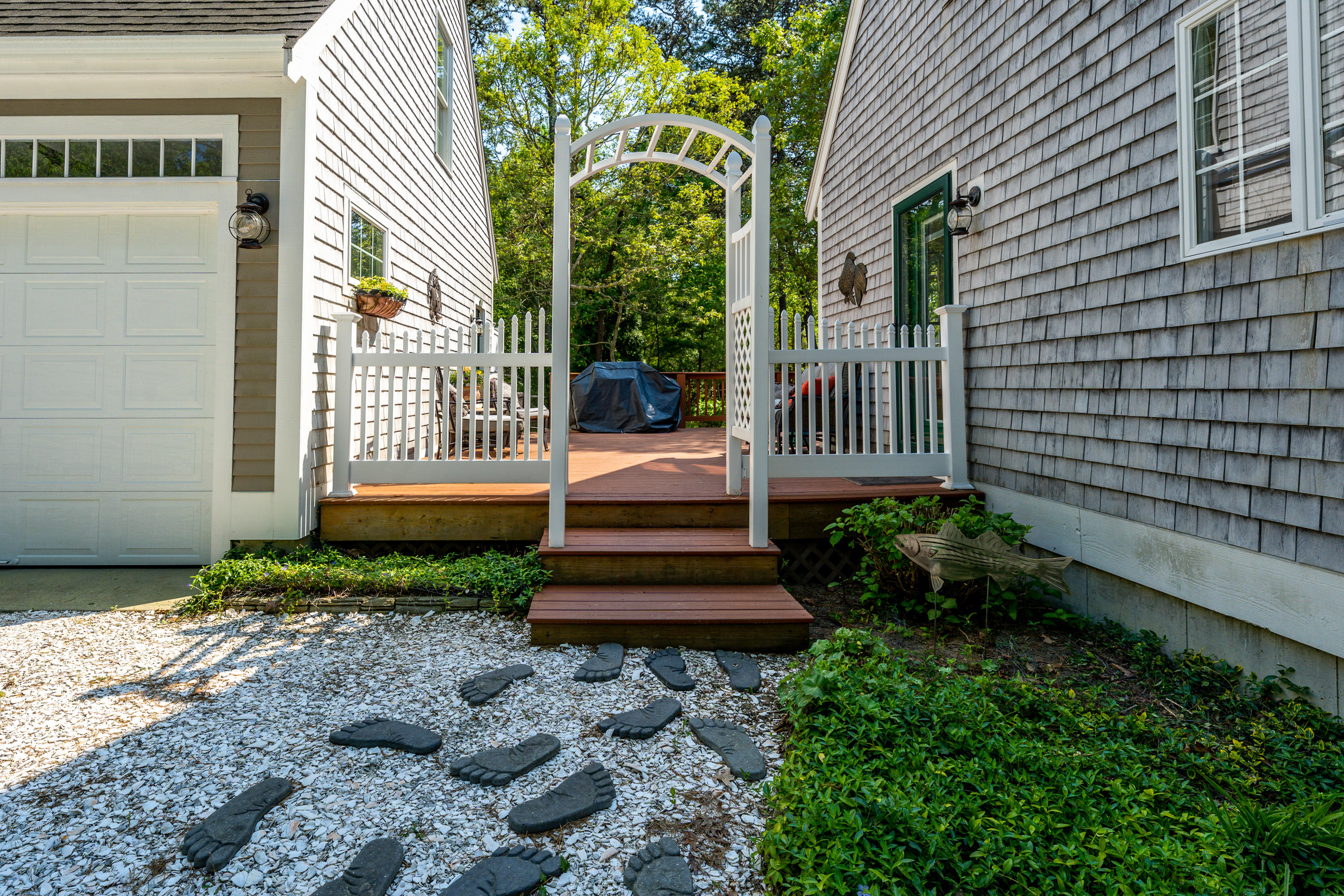 130 Browns Neck Road Wellfleet, MA 02667 - Photo 31 of 40 a front view of a house with a yard