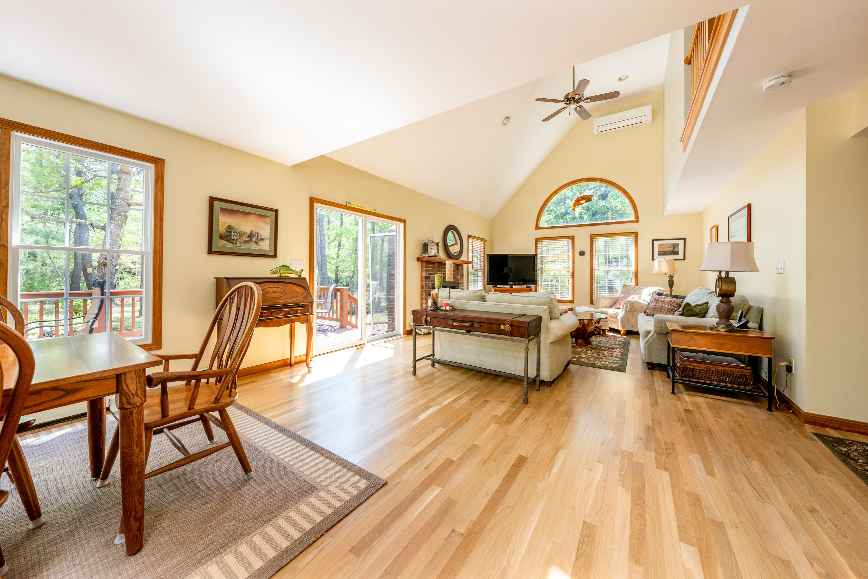 130 Browns Neck Road Wellfleet, MA 02667 - Photo 5 of 40 a living room with furniture and a large window