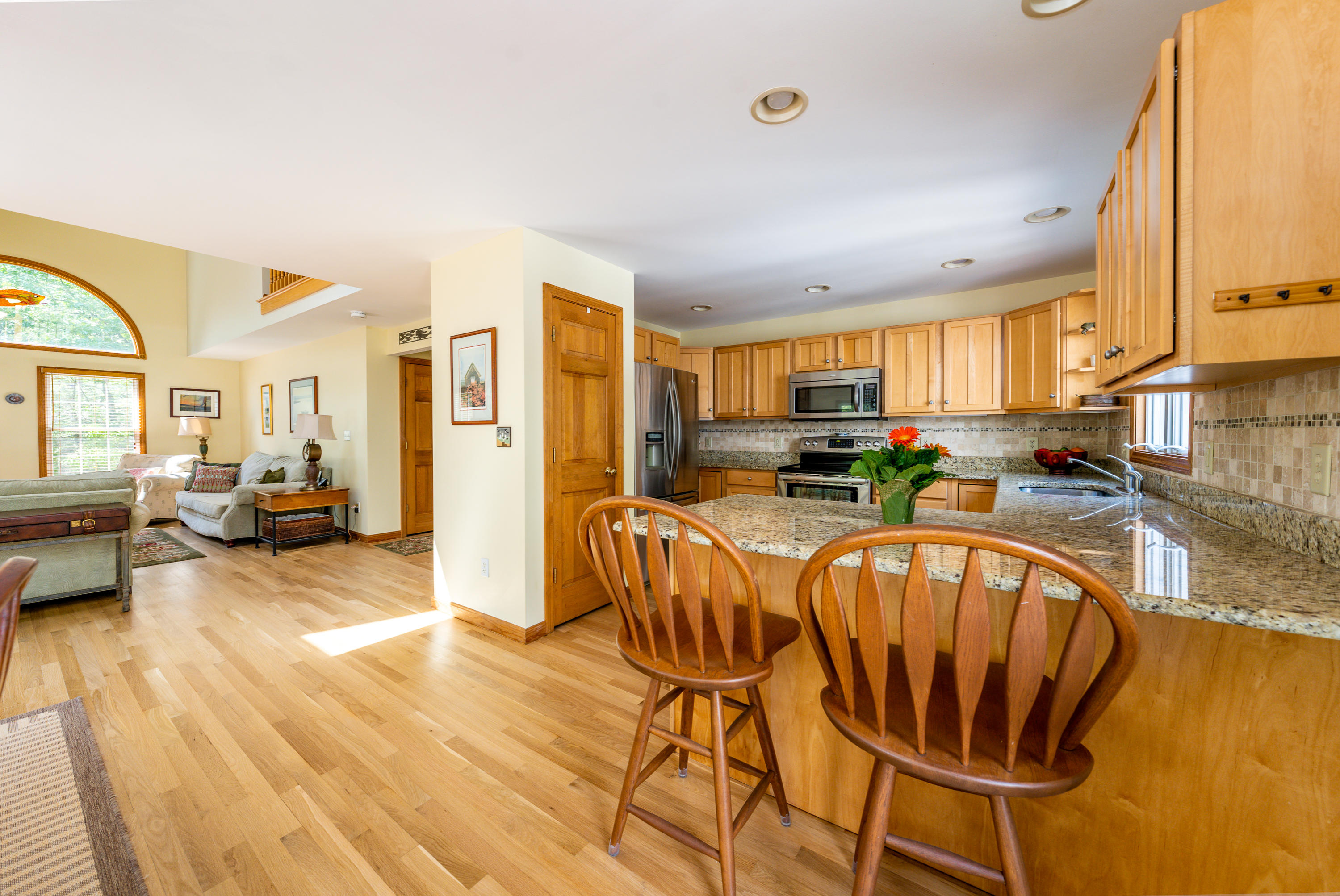 130 Browns Neck Road Wellfleet, MA 02667 - Photo 6 of 40 a view of a living room and a kitchen