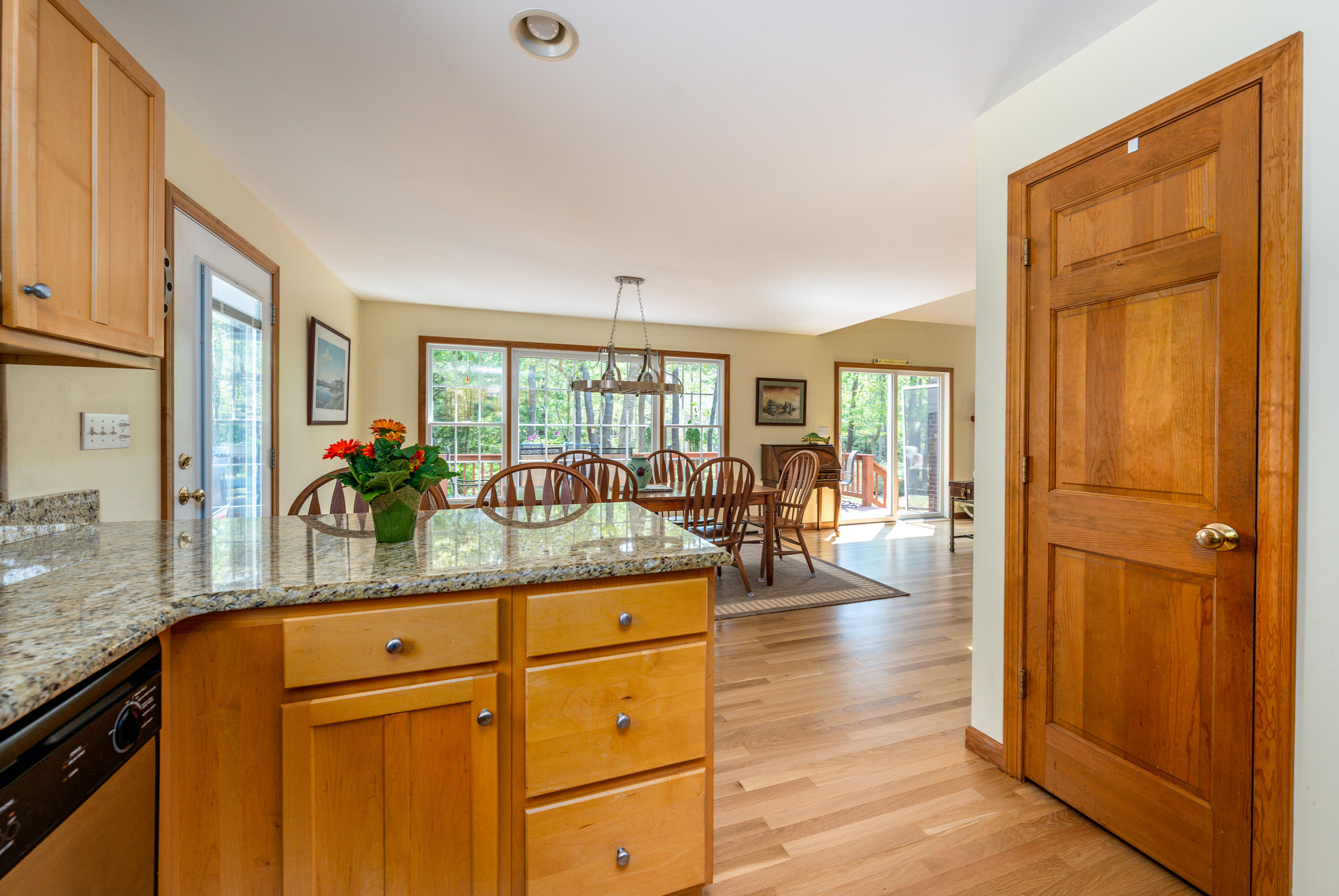 130 Browns Neck Road Wellfleet, MA 02667 - Photo 8 of 40 a living room with granite countertop kitchen island wooden floor and furniture