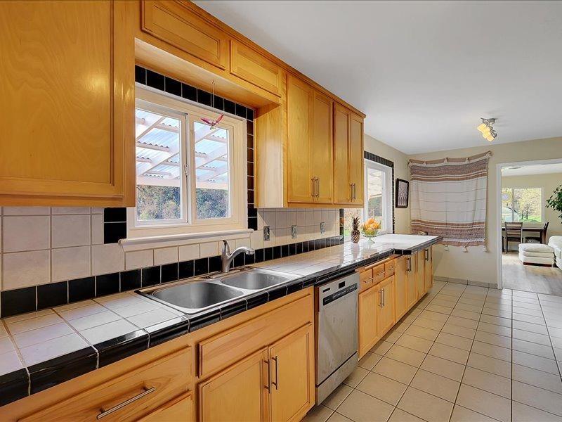 13001 Yuba-Nevada Road Dobbins, CA 95935 - Photo 15 of 63 a kitchen with a sink and a window