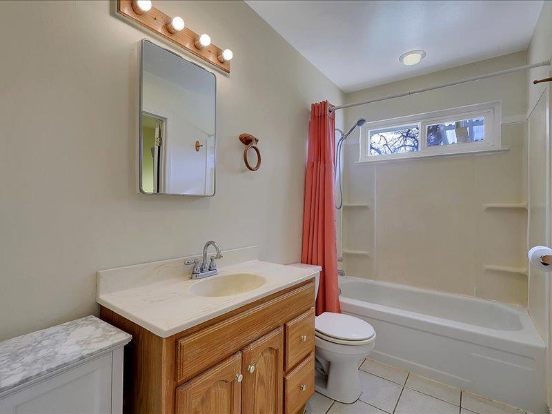 13001 Yuba-Nevada Road Dobbins, CA 95935 - Photo 20 of 63 a bathroom with a toilet sink and mirror