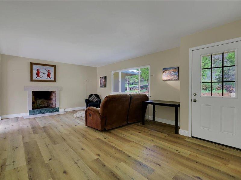 13001 Yuba-Nevada Road Dobbins, CA 95935 - Photo 27 of 63 a living room with furniture and a fireplace