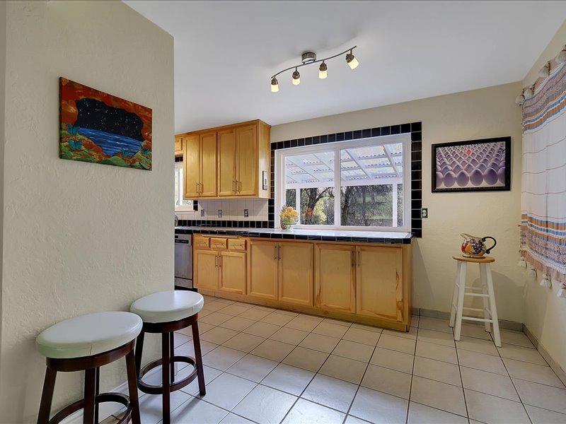 13001 Yuba-Nevada Road Dobbins, CA 95935 - Photo 7 of 63 a view of kitchen with furniture and window
