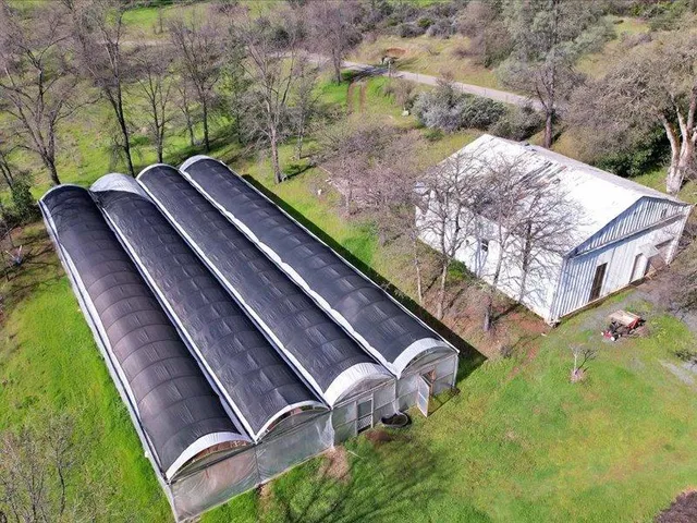 a living room with furniture and a chair