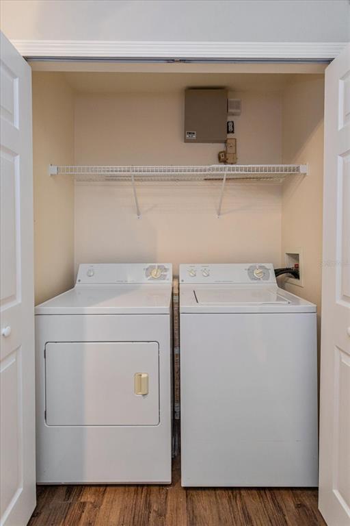 5455 Vineland Road, Unit 3214 Orlando, FL 32811 - Photo 13 of 25 a utility room with dryer and washer