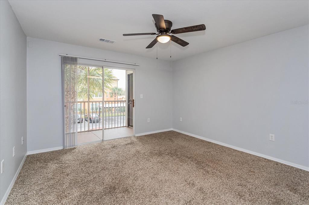 5455 Vineland Road, Unit 3214 Orlando, FL 32811 - Photo 8 of 25 a view of an empty room with a window