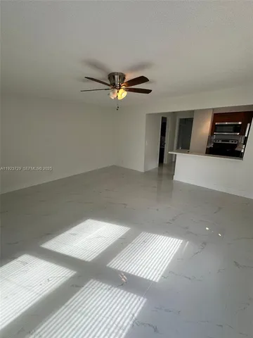 a view of a livingroom with furniture