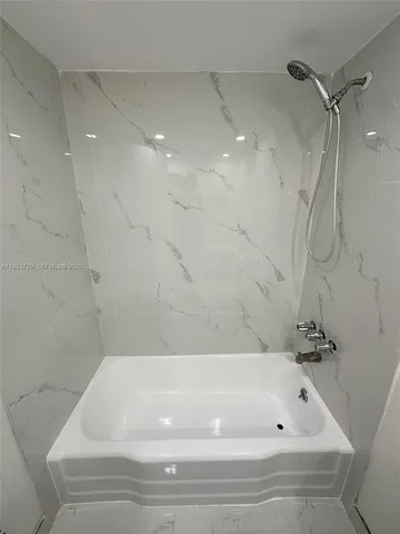 a bathroom with a bathtub