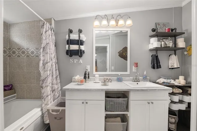 a bedroom with a bed and furniture