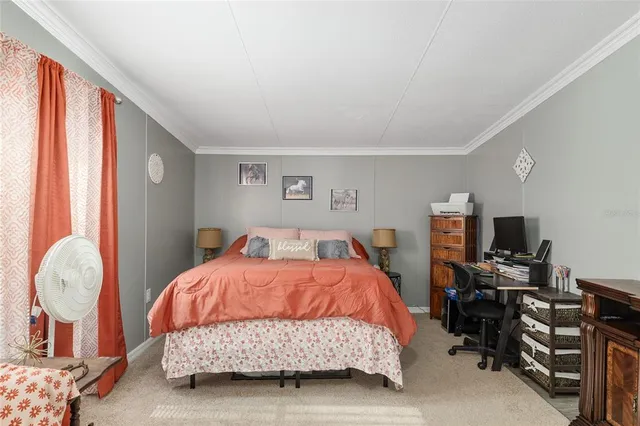 a bathroom with a sink mirror and shower