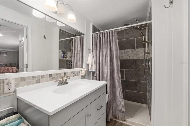 a balcony with table and chairs