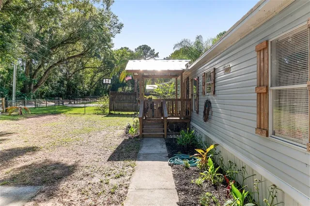 a view of balcony with wooden floor