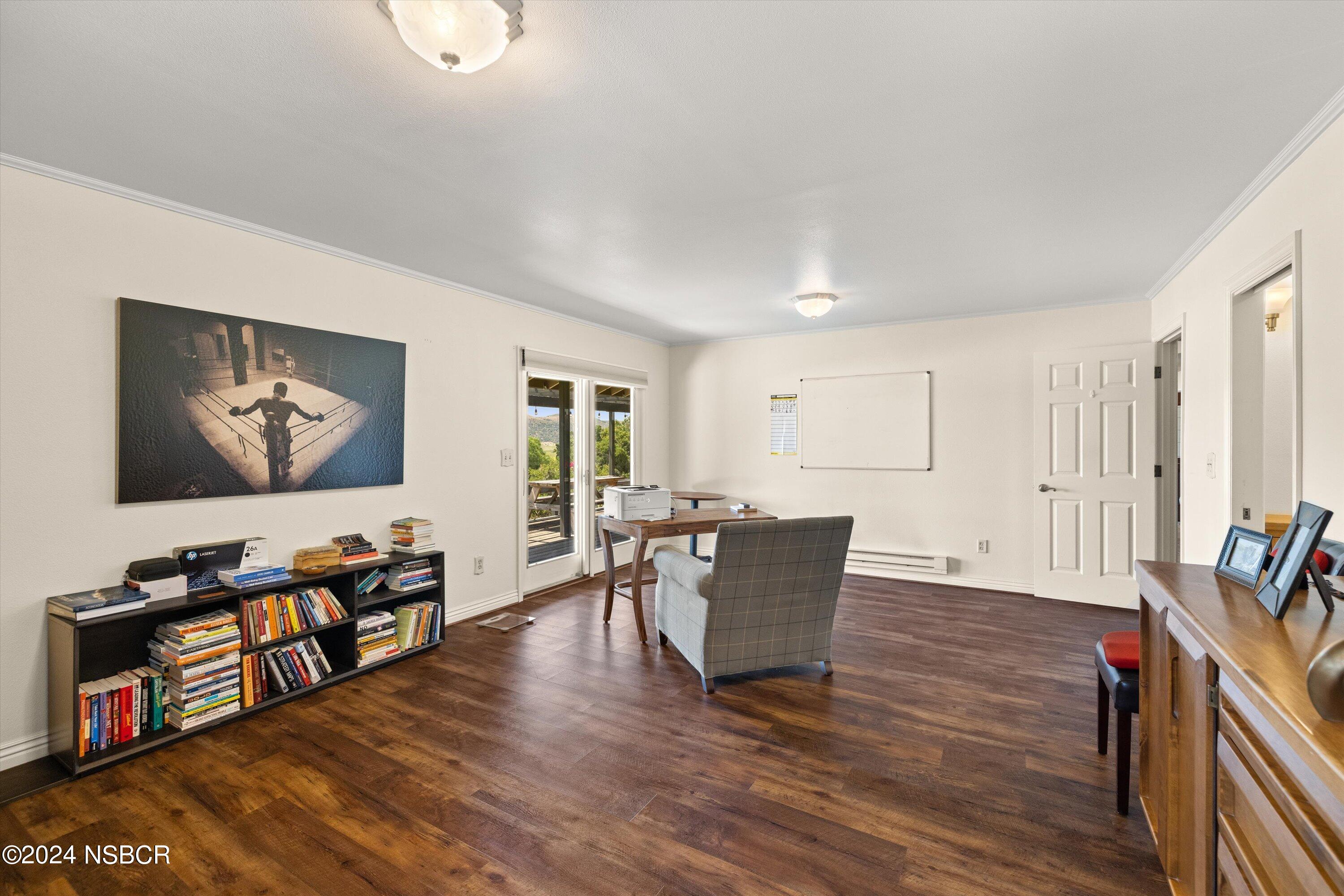 4281 Highway 246 Lompoc, CA 93436 - Photo 21 of 60 a living room with furniture and a flat screen tv