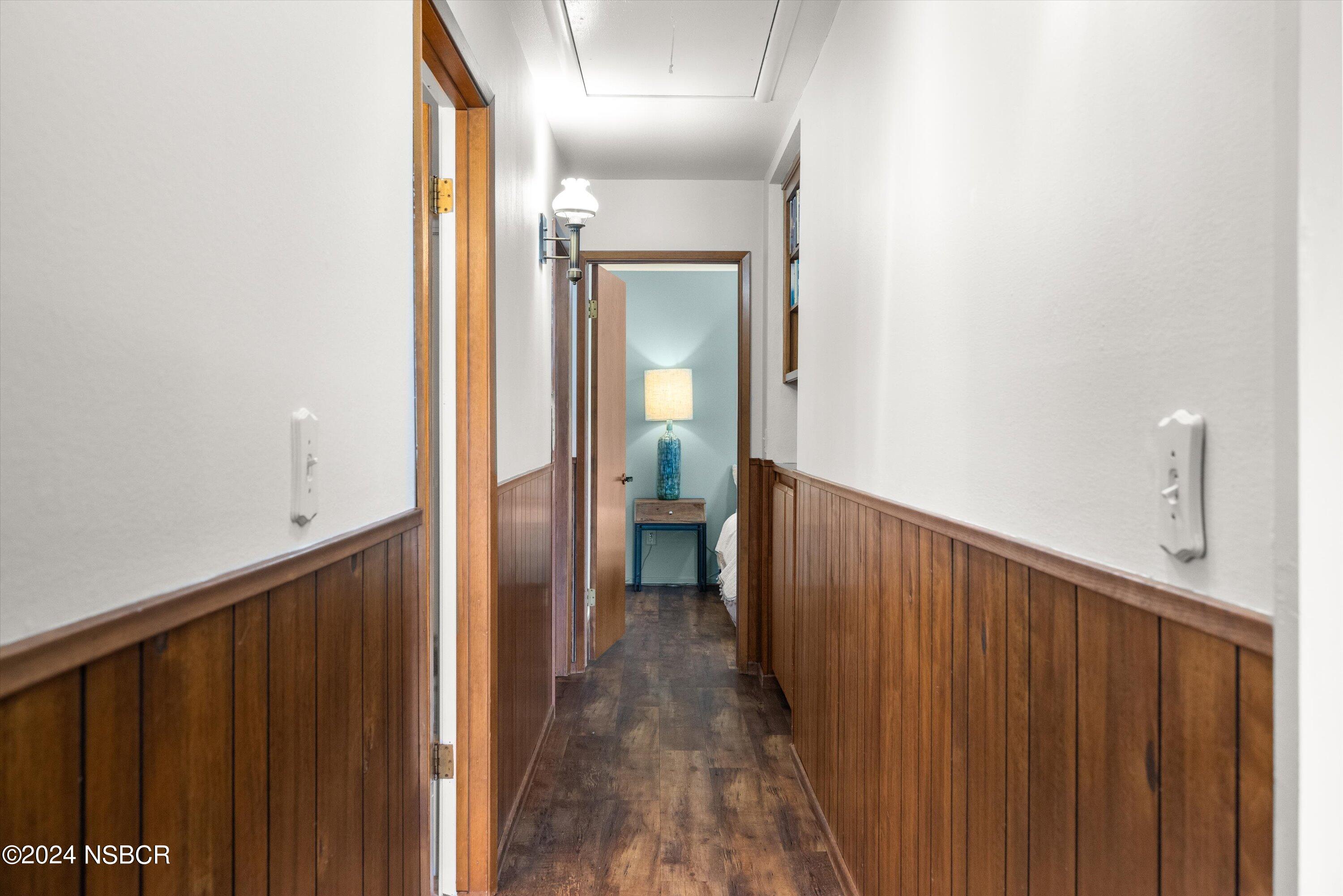 4281 Highway 246 Lompoc, CA 93436 - Photo 25 of 60 a view of a hallway with wooden floor and staircase