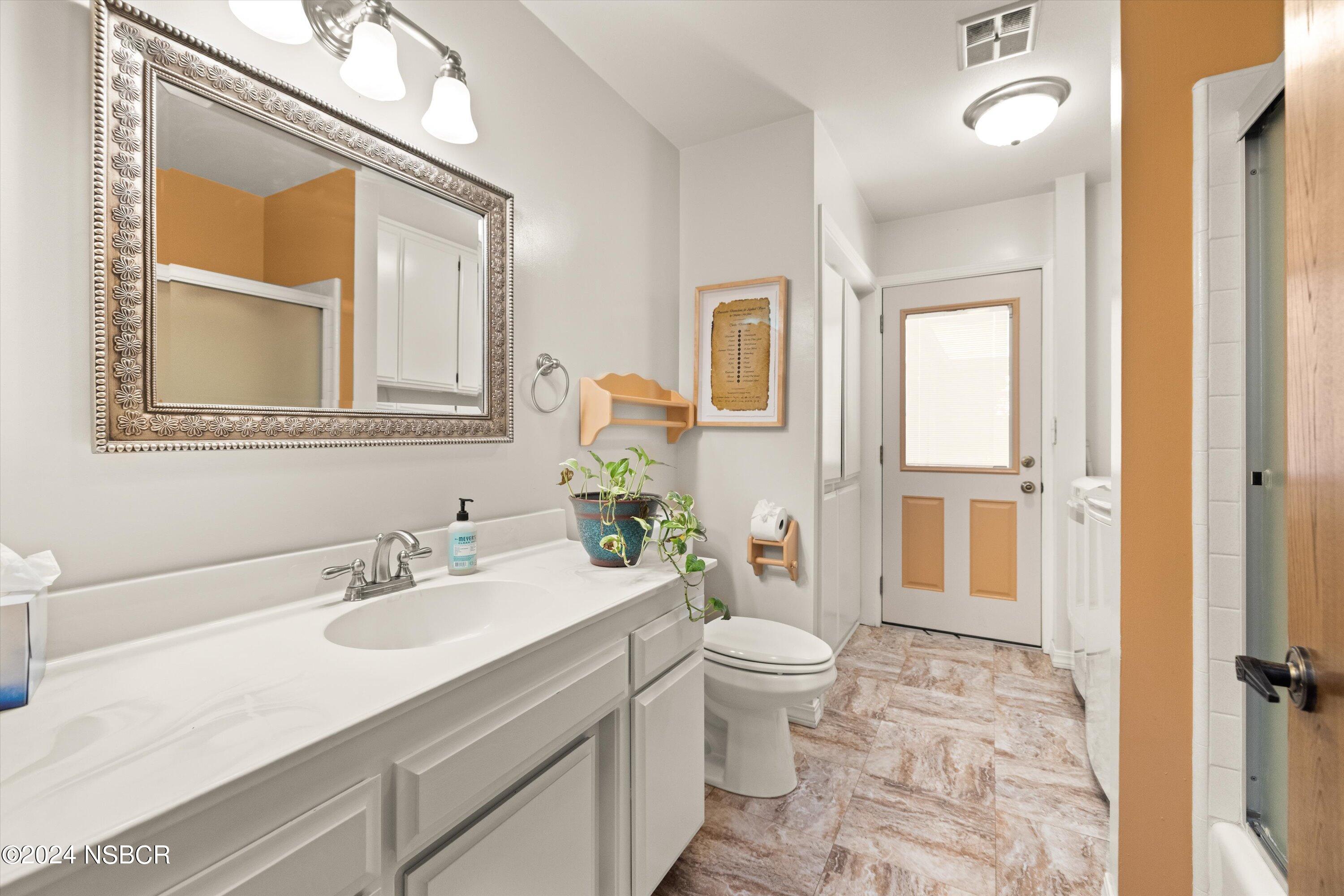 4281 Highway 246 Lompoc, CA 93436 - Photo 26 of 60 a bathroom with a sink toilet and shower