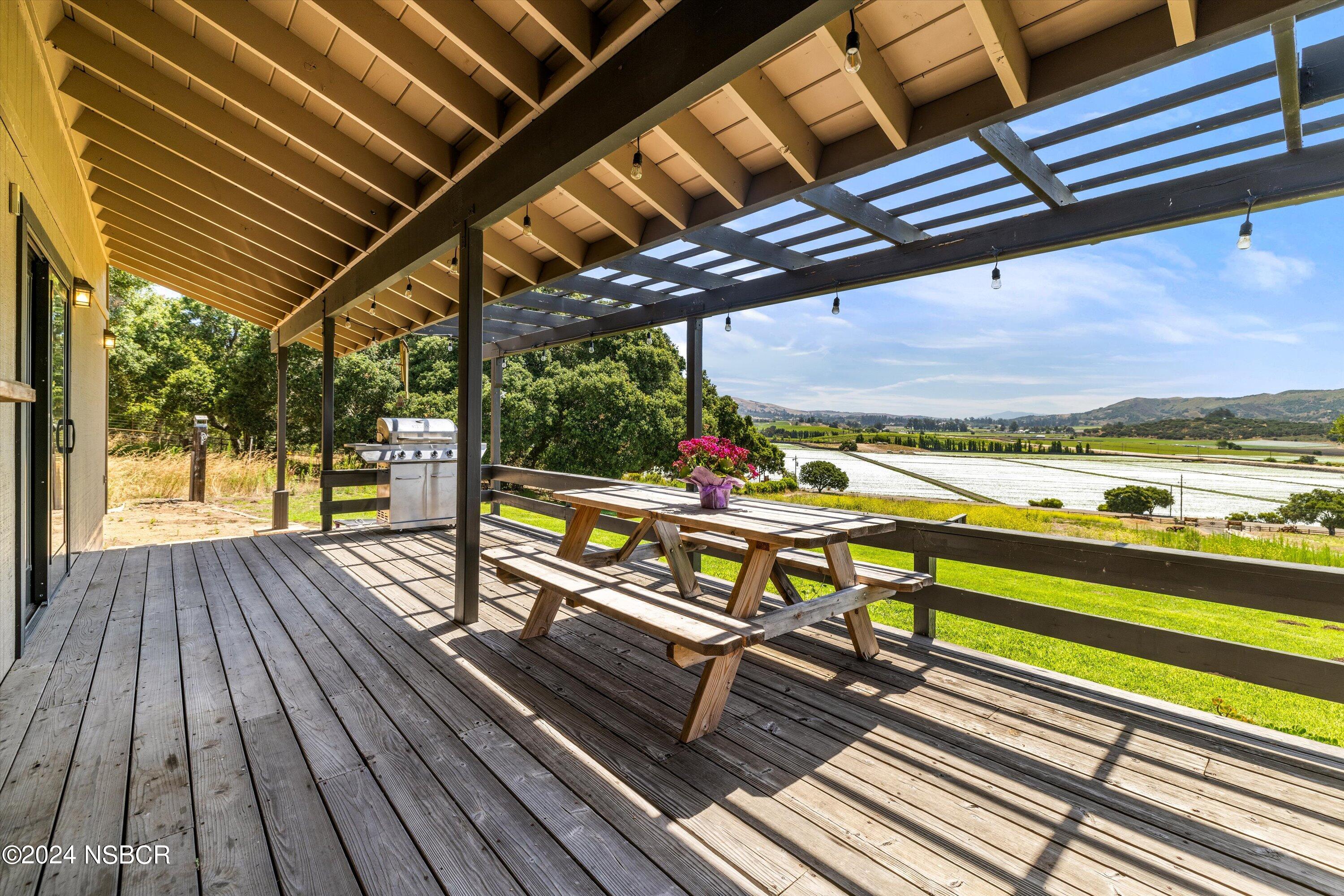 4281 Highway 246 Lompoc, CA 93436 - Photo 37 of 60 a view of a balcony with wooden floor