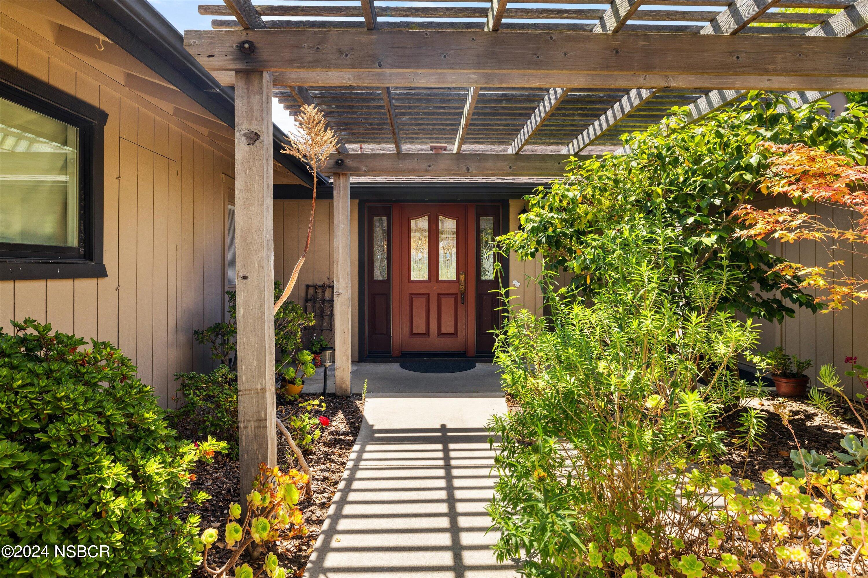 4281 Highway 246 Lompoc, CA 93436 - Photo 5 of 60 a porch with a potted plant
