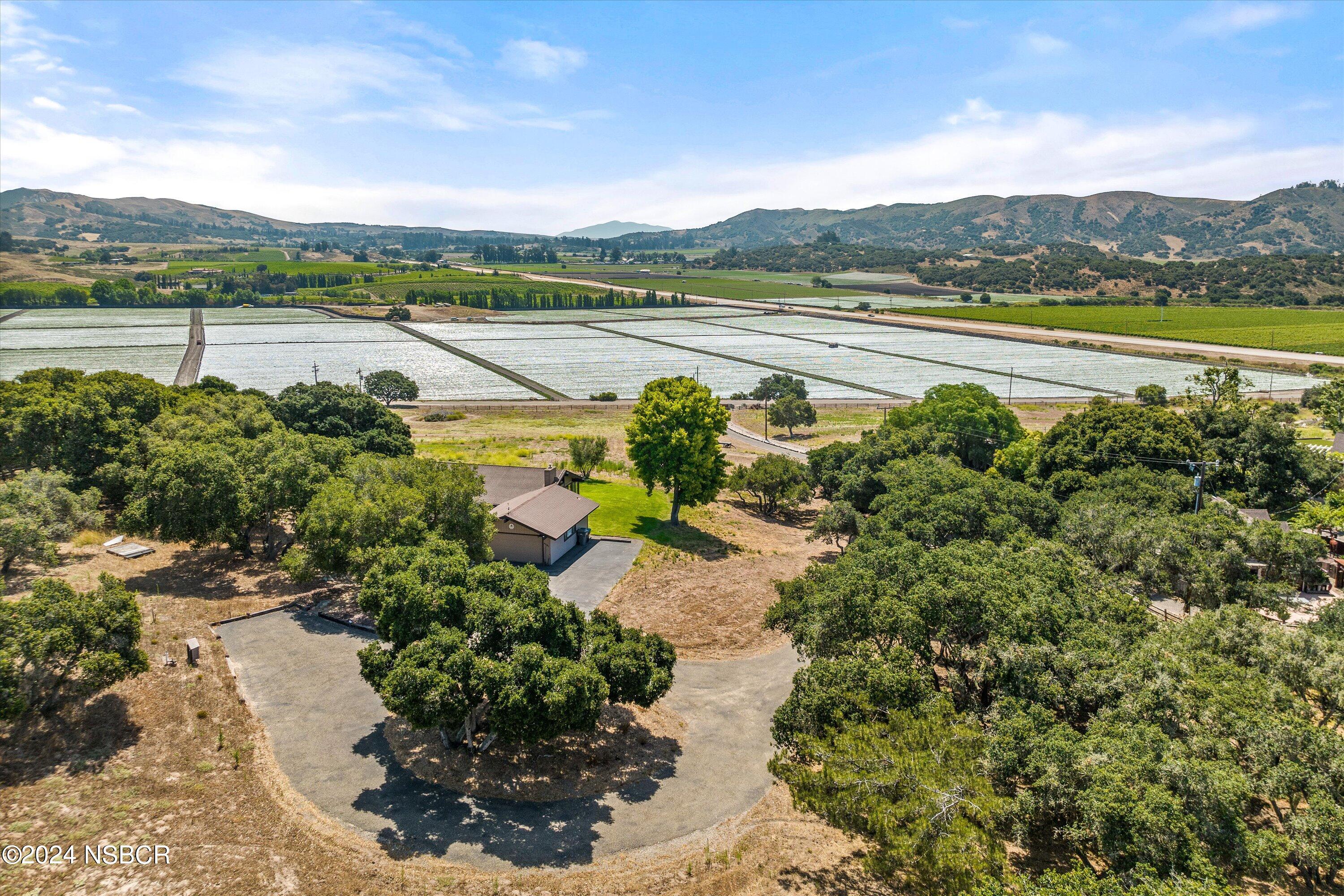 4281 Highway 246 Lompoc, CA 93436 - Photo 53 of 60 a view of a lake with a mountain