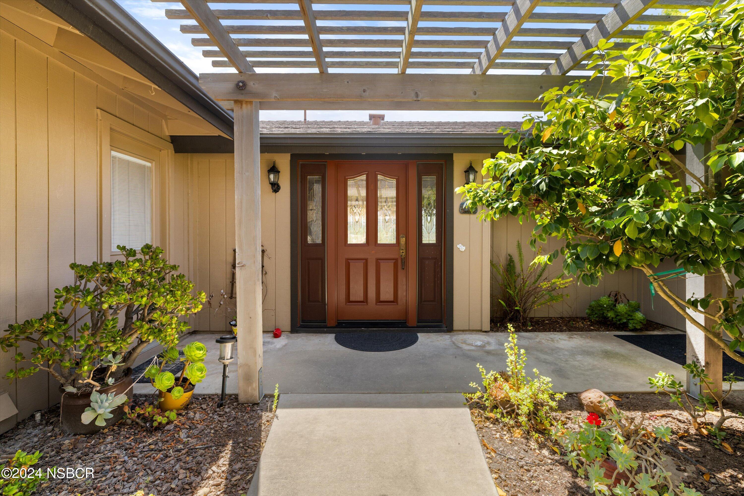 4281 Highway 246 Lompoc, CA 93436 - Photo 6 of 60 a view of a porch with a potted plant