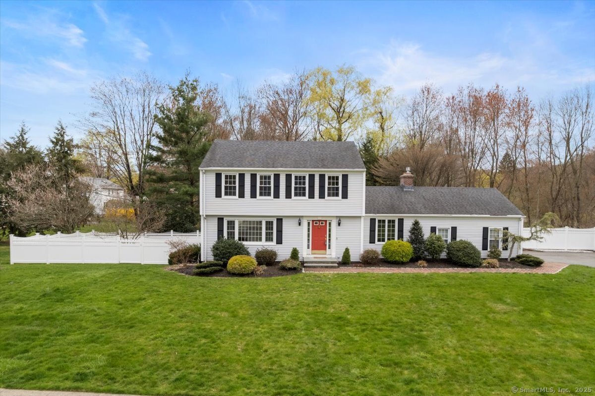 a view of a house with a big yard