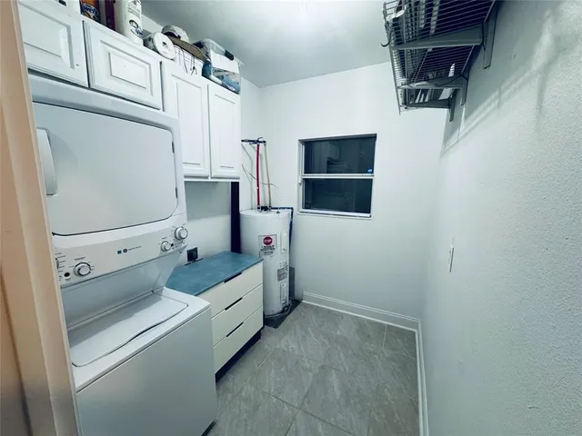 a bathroom with a double vanity sink and mirror