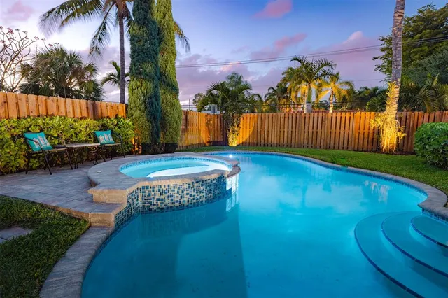 a view of swimming pool with a garden