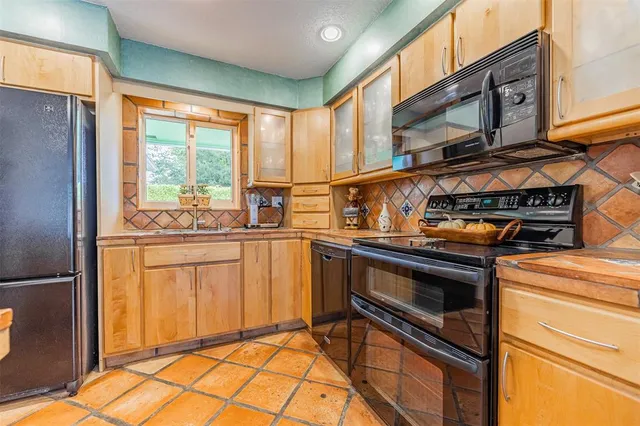 a view of a porch with a garden