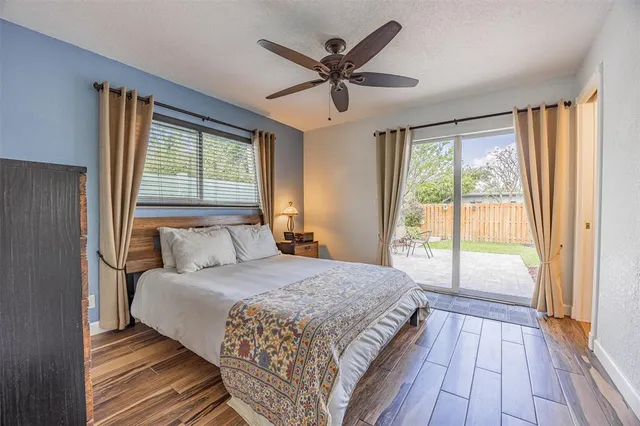 a room with furniture a chandelier and a window