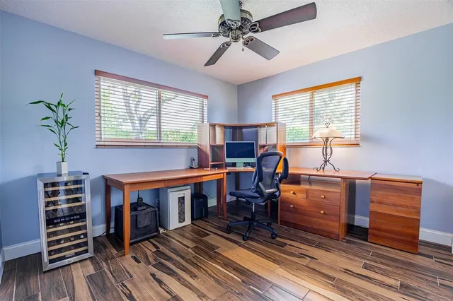 a view of a tables and chairs in patio