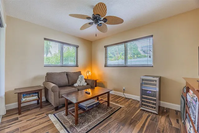 a view of a swimming pool with a yard