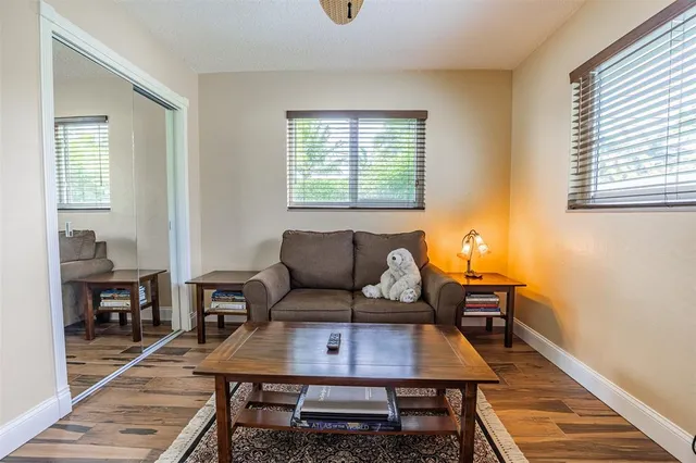 an outdoor space with furniture and garden