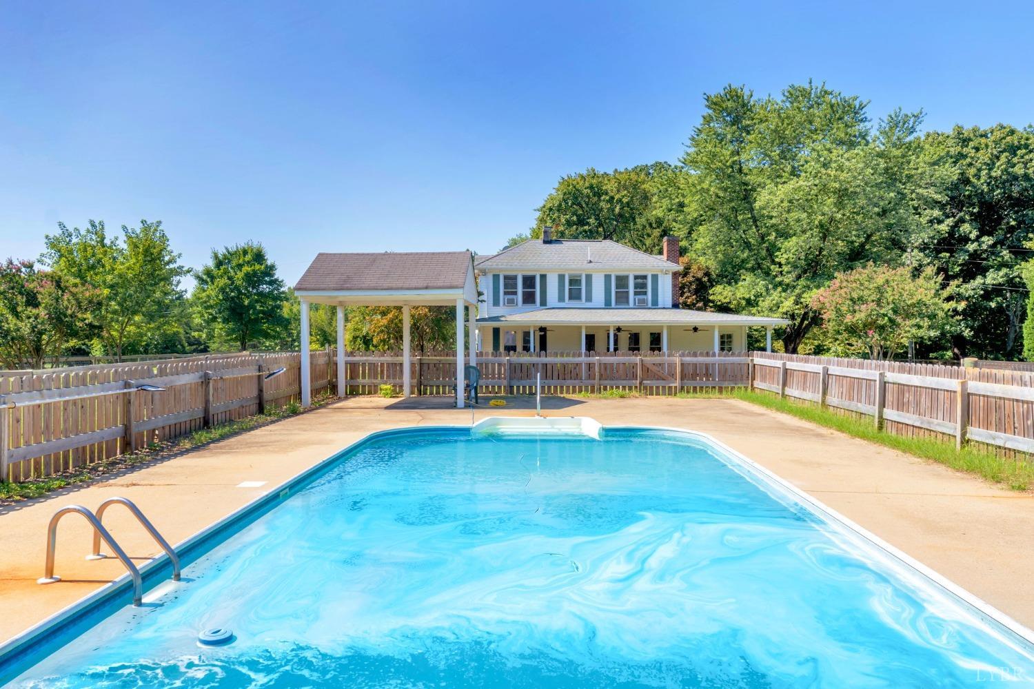 5581 Buffalo Road Dillwyn, VA 23936 - Photo 4 of 56 a view of a house with swimming pool and porch with furniture