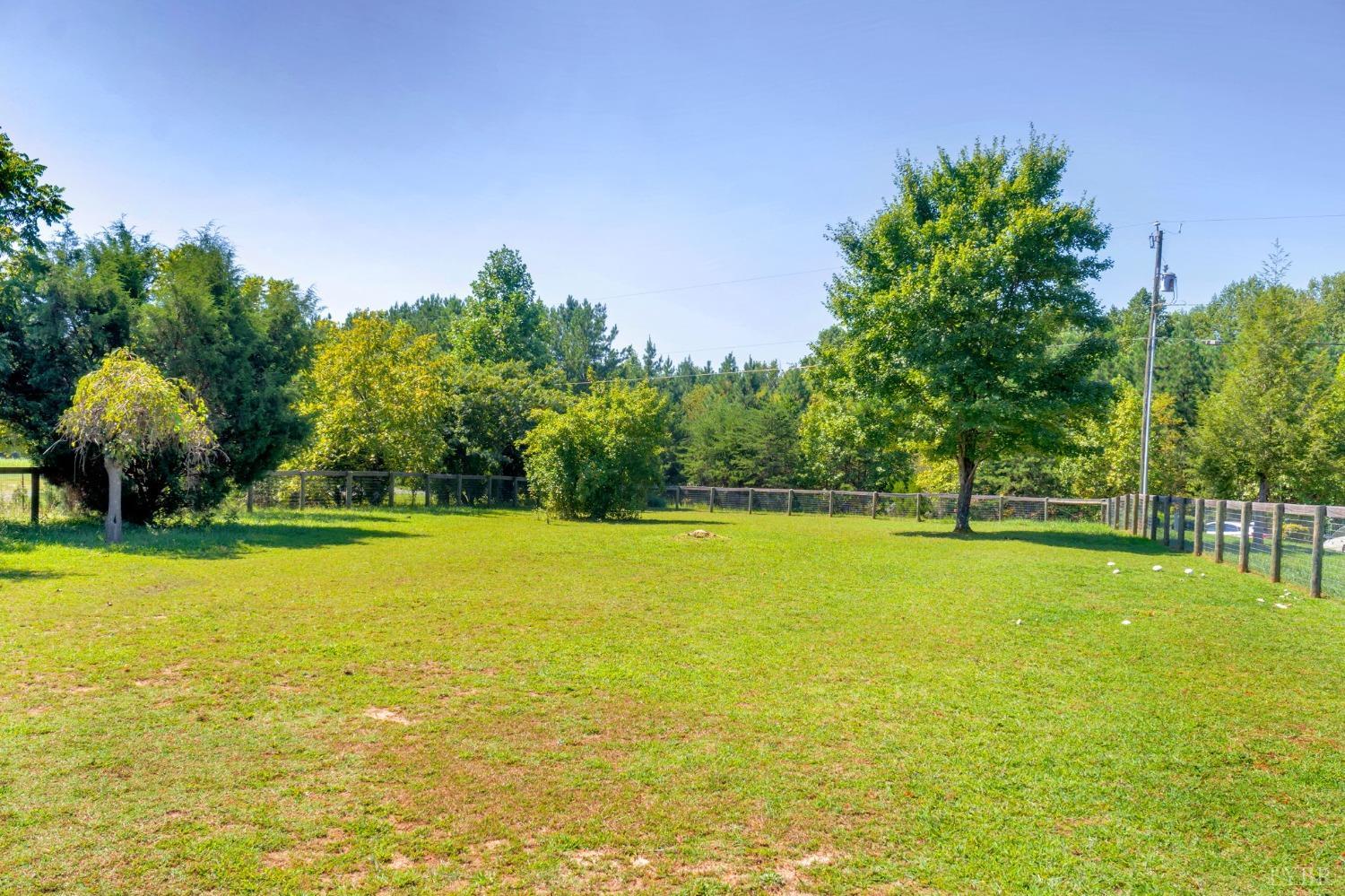 5581 Buffalo Road Dillwyn, VA 23936 - Photo 54 of 56 a view of a swimming pool with an outdoor space and seating area
